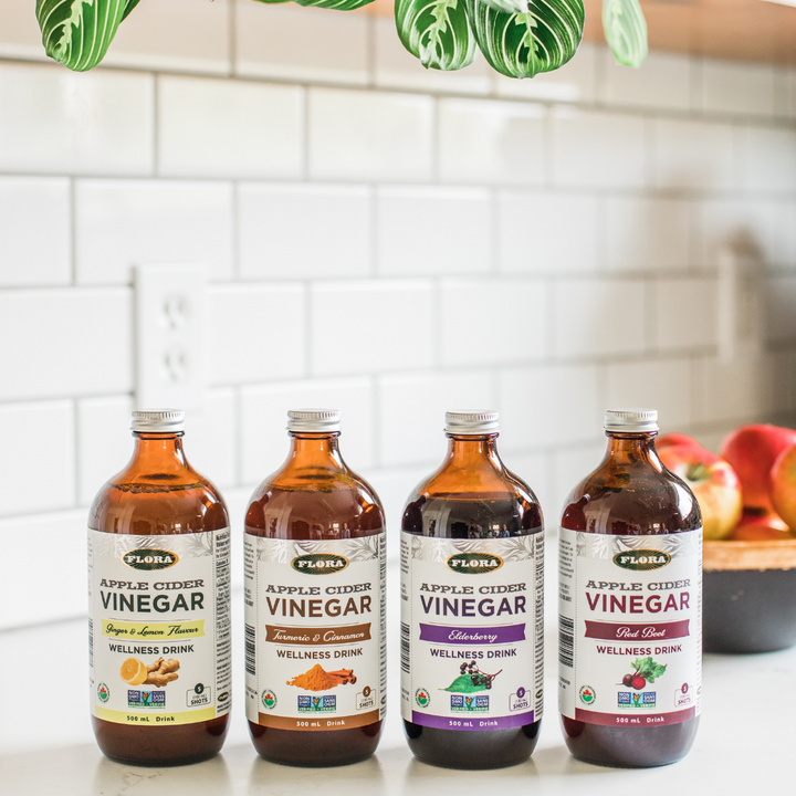 Flora organic and non-gmo apple cider vinegar in four natural flavors: lemon ginger, cinnamon turmeric, elderberry, and red beet