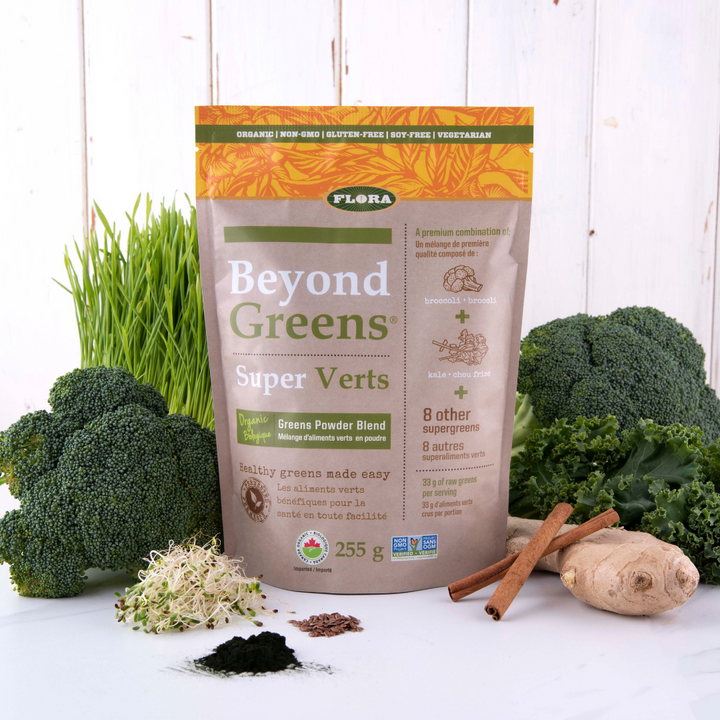 Flora Health Beyond Greens 10 raw super greens pictured with natural ingredients: broccoli, kale, cinnamon, ginger,  and others